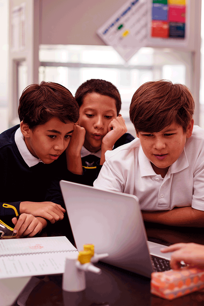 Students working on a laptop